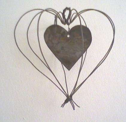 Beautiul rustic wire heart with hand-cut tin heart in the middle - stunning!