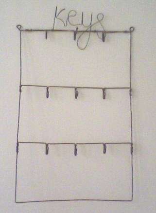 Practical 9-hook key-holder.
