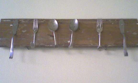 Quaint hook - old cutlery on wood, lovely item.