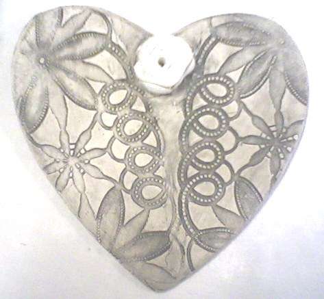 Beautiful handmade ceramic heart with rose motif - stunning!