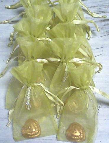 Heart chocolate in gold organza bag - lot of 10 bags.