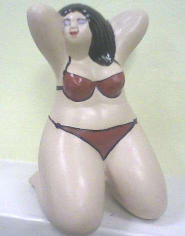 Beautiful painted 'Fat Lady' ornament.