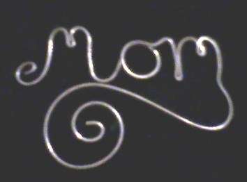 Mini silver wire word for scrapbooking or cardmaking - 1cm high.