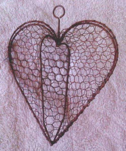 Rustic wire mesh hearts that open up and can be filled with anything you love!
