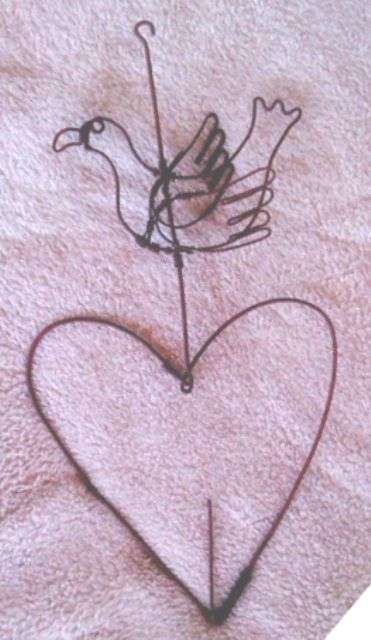 Handcrafted bird-detail fruit holder - lovely to attract birds to your garden!