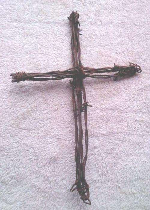 Rustic barbwire cross - lovely!