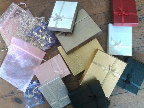 Variety of jewellery gift boxes and organza bags. 24 pieces