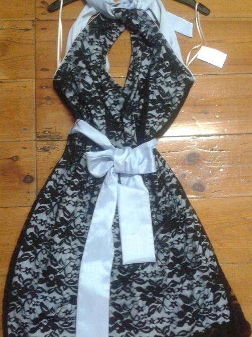 sky blue stretch dress with stretch lace overlay and keyhole necklin.  Size L