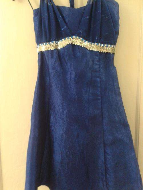Royal blue infinity style dress.  Tie the straps in different ways. Size S