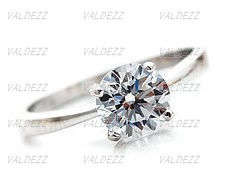 EXQUISITE DIAMOND RING IN 925 STERLING SILVER (stamped 925)