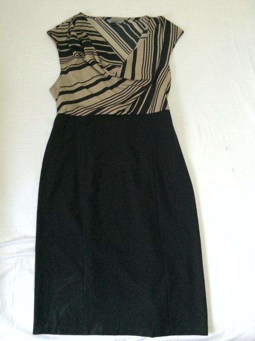 FORMAL DRESS IN CHAMPAIGN AND BLACK COLOUR / LABEL is FINIGGANS / SIZE IS 42 / BRAND NEW