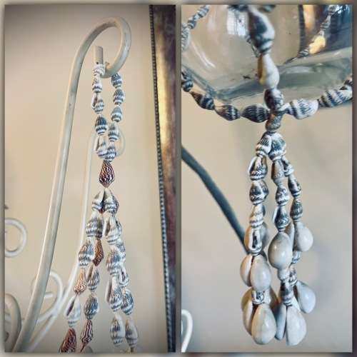 Macramé sea shell plant hanger or I used ot as a candle holder