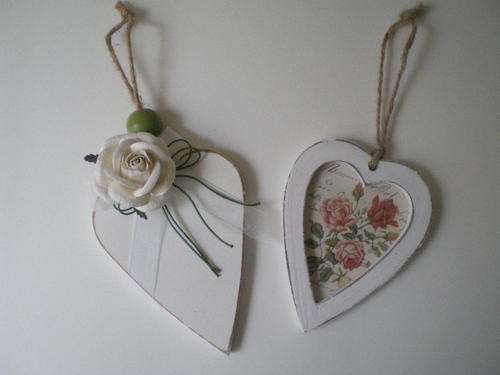 Two pretty decorated wooden hearts