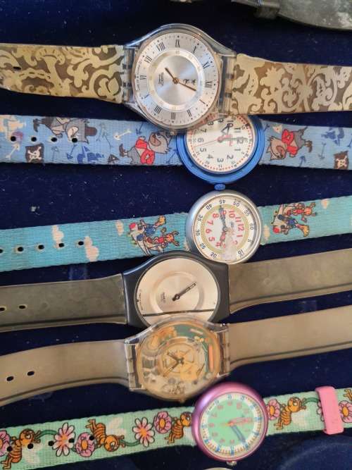 A JOBLOT OF 13 WOMANS OR GIRLS SWATCH WATCHES ALL NEED NEW BATTERIES