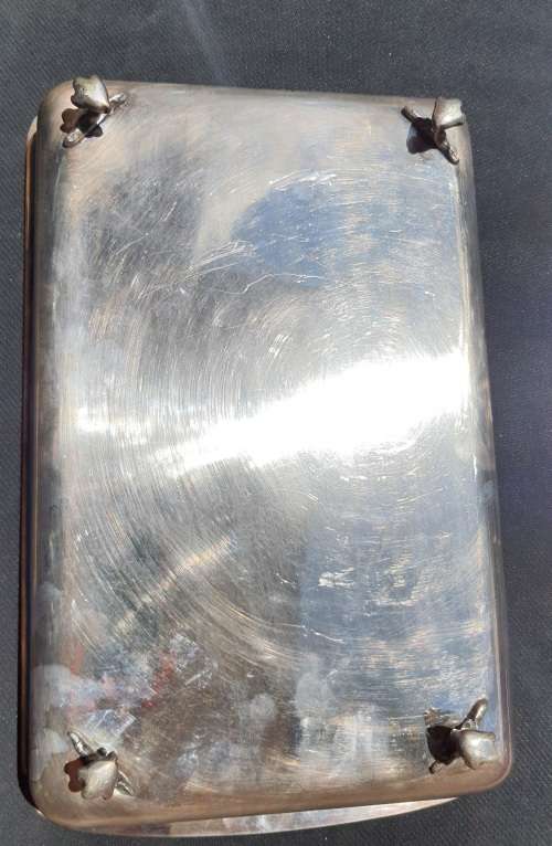 AN ANTIQUE SILVER PLATED SERVING TRAY STAMPED SP ON K