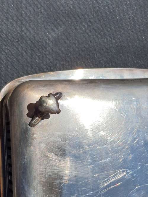 AN ANTIQUE SILVER PLATED SERVING TRAY STAMPED SP ON K