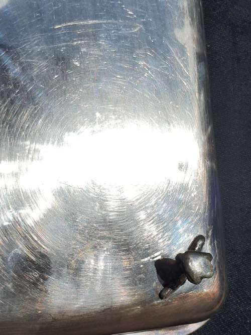 AN ANTIQUE SILVER PLATED SERVING TRAY STAMPED SP ON K