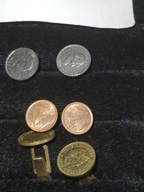 A JOBLOT COIN CUFFLINKS