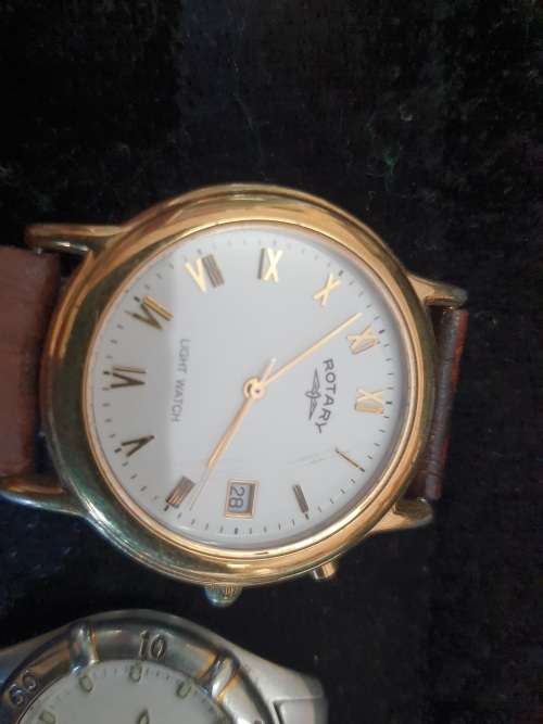a JOBLOT OF WOMANS WATCHES SOLD AS IS NOT TESTED