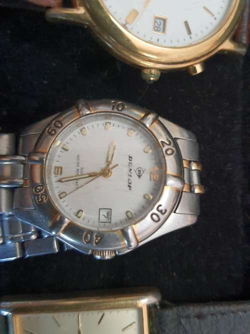 a JOBLOT OF WOMANS WATCHES SOLD AS IS NOT TESTED