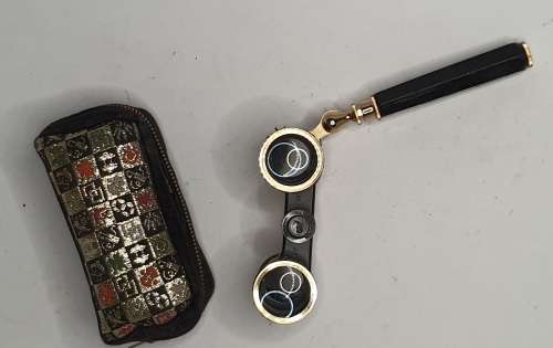 A VINTAGE LADIES OPERA BINOCULARS WITH FANCY TAPESTRY DESIGN BOTH THE BINOCULARS AND THE CASE SOLD A