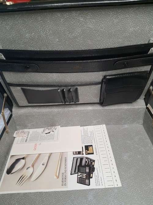 A BRAND NEW GERMAN SBS LEATHER BRIEF CASE SOLD AS IS
