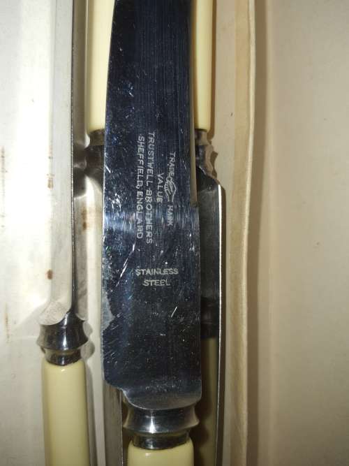 A SET OF SIX BONE HANDLED STEAK KNIVES STAINLESS  STEEL BY TRUSTWELL BROTHERS SHEFFIELD ENGLAND