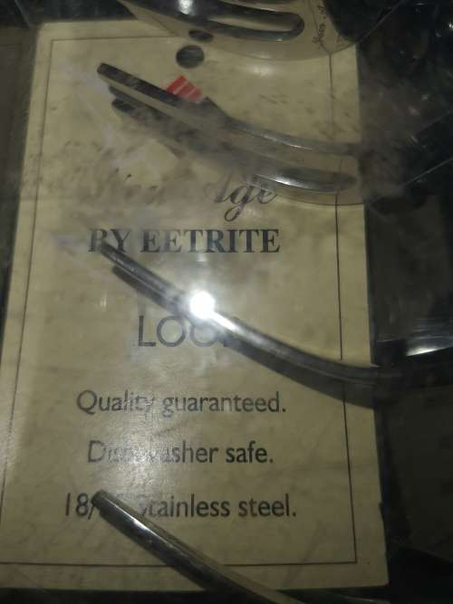 A SET OF LOOP EETRITE COCKTAIL FORKS