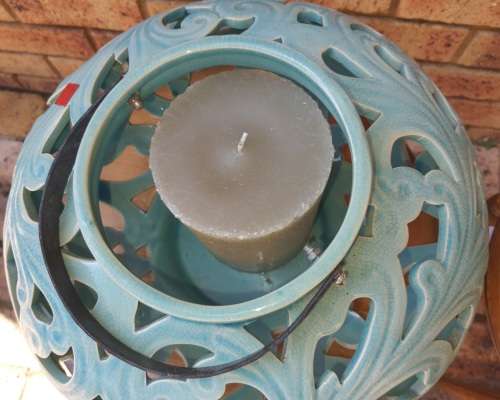 AN EXCEPTIONAL SET CERAMIC ORNATELY DESIGNED TURQUOIS COLOURED CANDLE HOLDERS