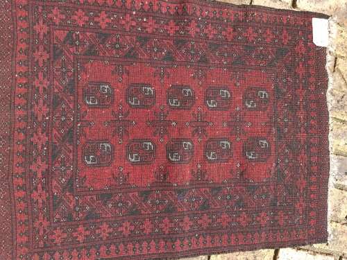 A VINTAGE PERSIAN CARPET USED DIAMENSIONS 42X32 INCHES APPROXIMATELY, IT IS A FAIRLY GOOD CONDITION