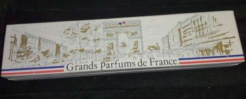 A FRENCH MINITURE PERFUME SET SOLD AS IS