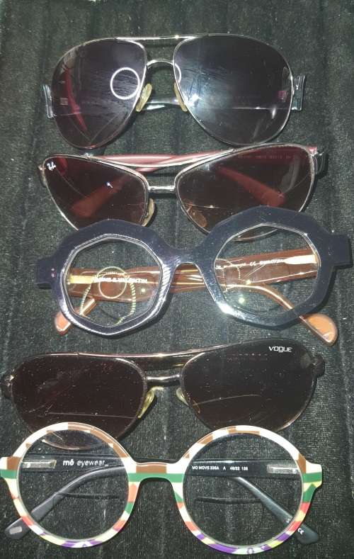 A COLLECTION OF QUALITY BRANDED SUNGLASSES SOLD AS IS