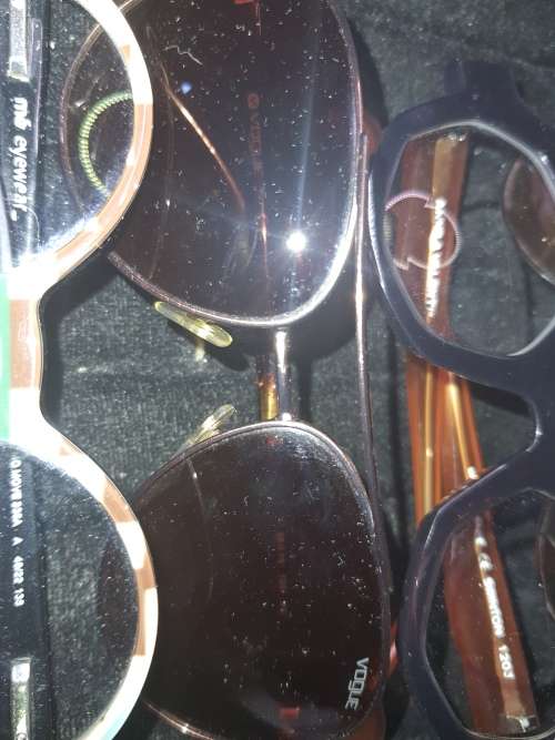 A COLLECTION OF QUALITY BRANDED SUNGLASSES SOLD AS IS