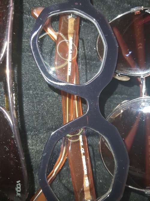 A COLLECTION OF QUALITY BRANDED SUNGLASSES SOLD AS IS