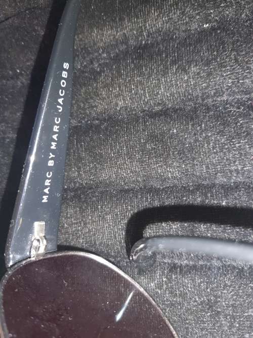 A COLLECTION OF QUALITY BRANDED SUNGLASSES SOLD AS IS