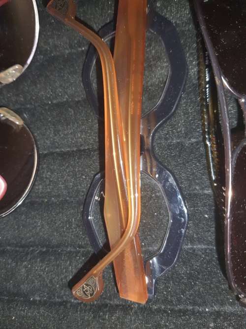 A COLLECTION OF QUALITY BRANDED SUNGLASSES SOLD AS IS