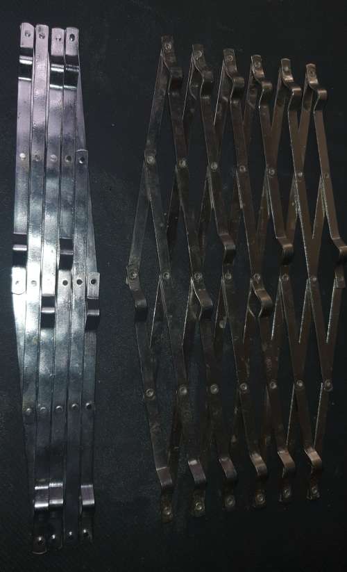 TWO VINTAGE STAINLESS STEEL EXPANDING HOT POT PLACE METS SOLD AS IS