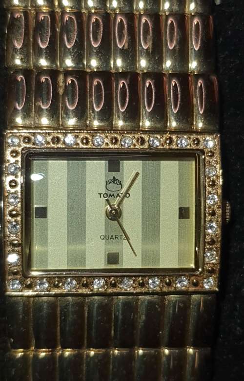 A fancy collection of Tamato womans quartz watches sold as is not tested
