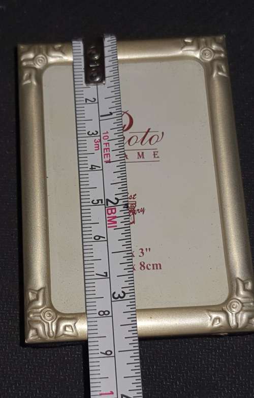 TWO VIRTUALLY BRAND-NEW SMALL PICTURE FRAMES SOLD AS IS