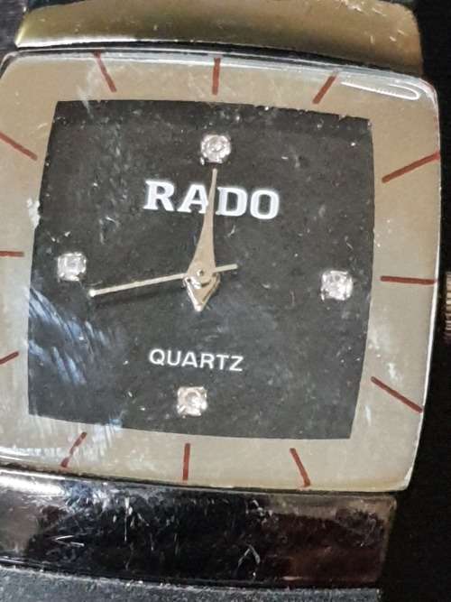 A vintage RADO rubber band wristwatch sold as is not tested