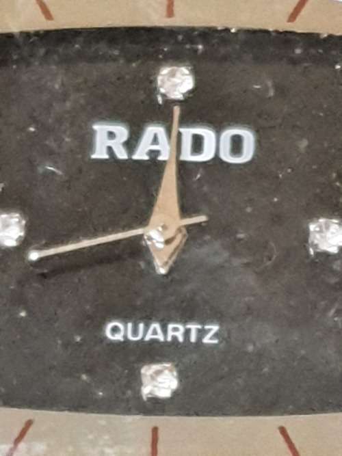 A vintage RADO rubber band wristwatch sold as is not tested