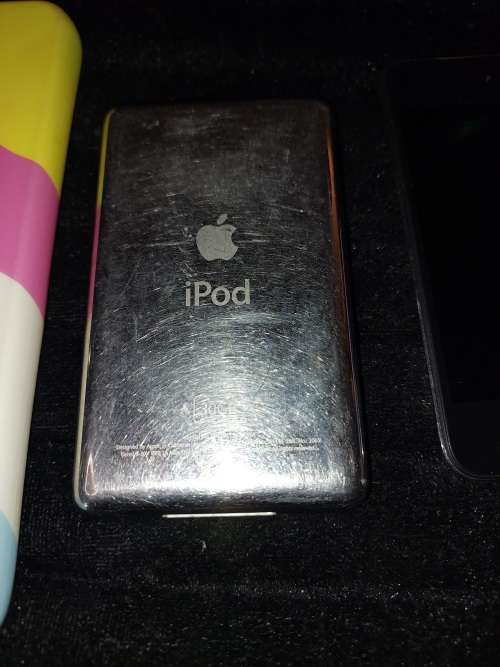 TWO  APPLE  IPODS AND 2 IPHONE COVERS SOLD AS IS NOT TESTED