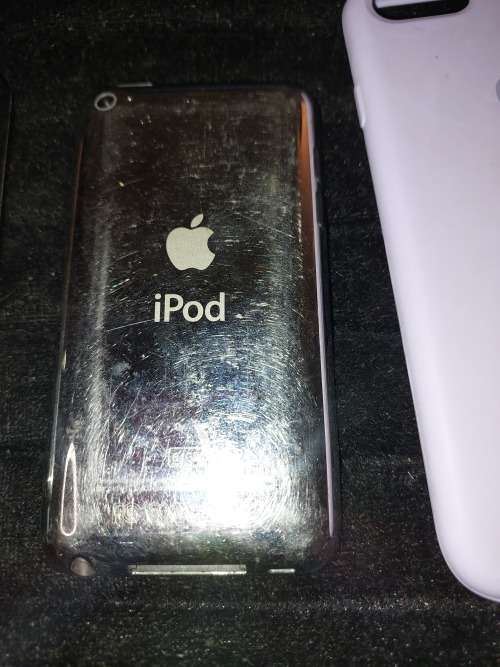TWO  APPLE  IPODS AND 2 IPHONE COVERS SOLD AS IS NOT TESTED