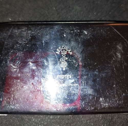 A VINTAGE STAINLESS STEEL SET EAR WAX REMOVER MADE IN GERMANY