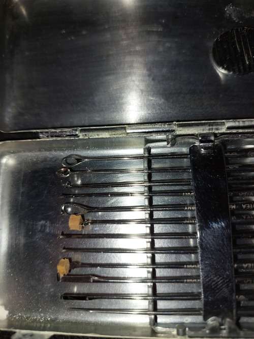 A VINTAGE STAINLESS STEEL SET EAR WAX REMOVER MADE IN GERMANY