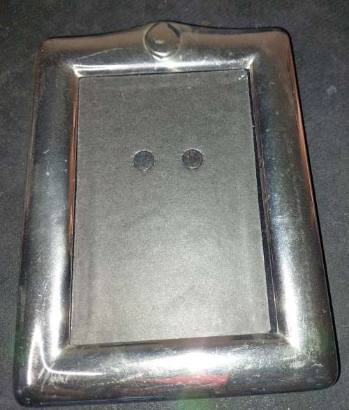 A COLLECTION OF STAINLESS STEEL CHROME PHOTI FRAMES