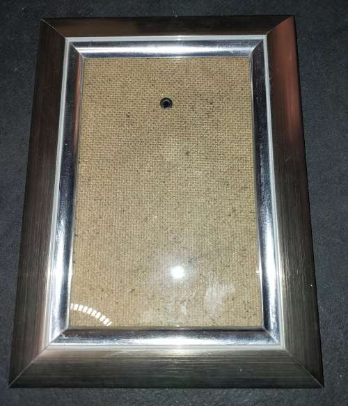 A COLLECTION OF STAINLESS STEEL CHROME PHOTI FRAMES