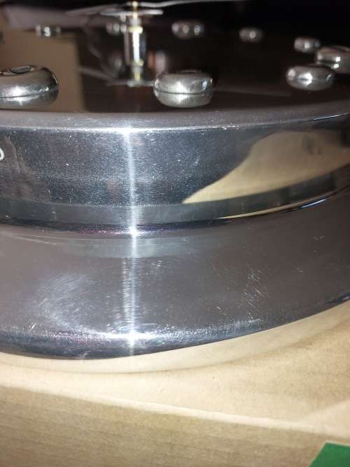 A beautiful virtually brand new Carol Boyes style aluminum alloy clock 32 centimeters diameter