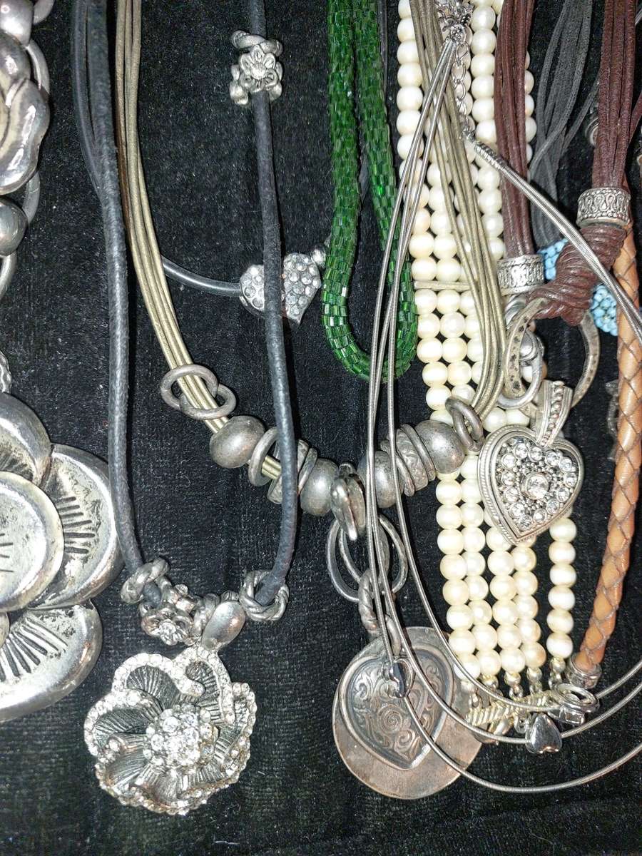 A COLLECTION OF VINTAGE COSTUME NECKLACES SOLD AS IS