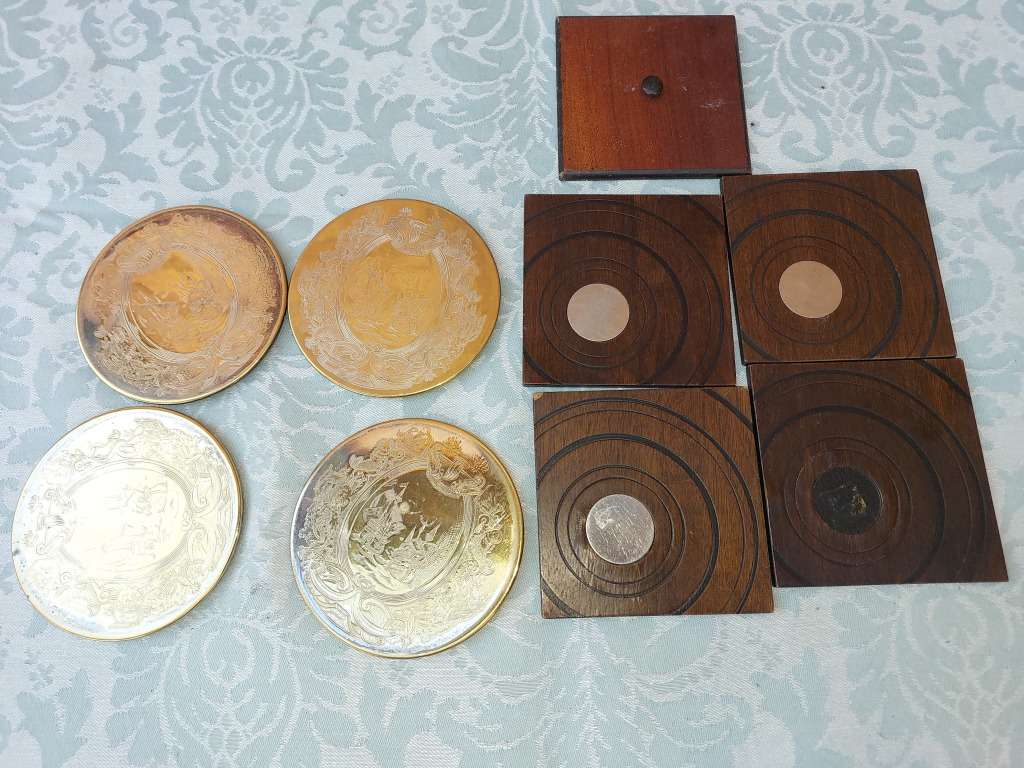 A COLLECTION OF COASTERS FOR THE BAR